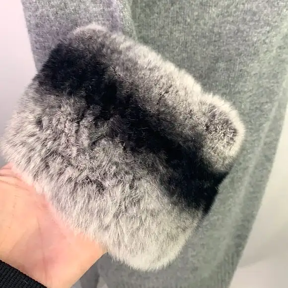 Graycashmeresweater with fur trim cuffs