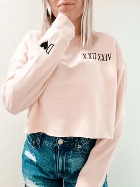 Roman numeral date embroidered cropped sweater